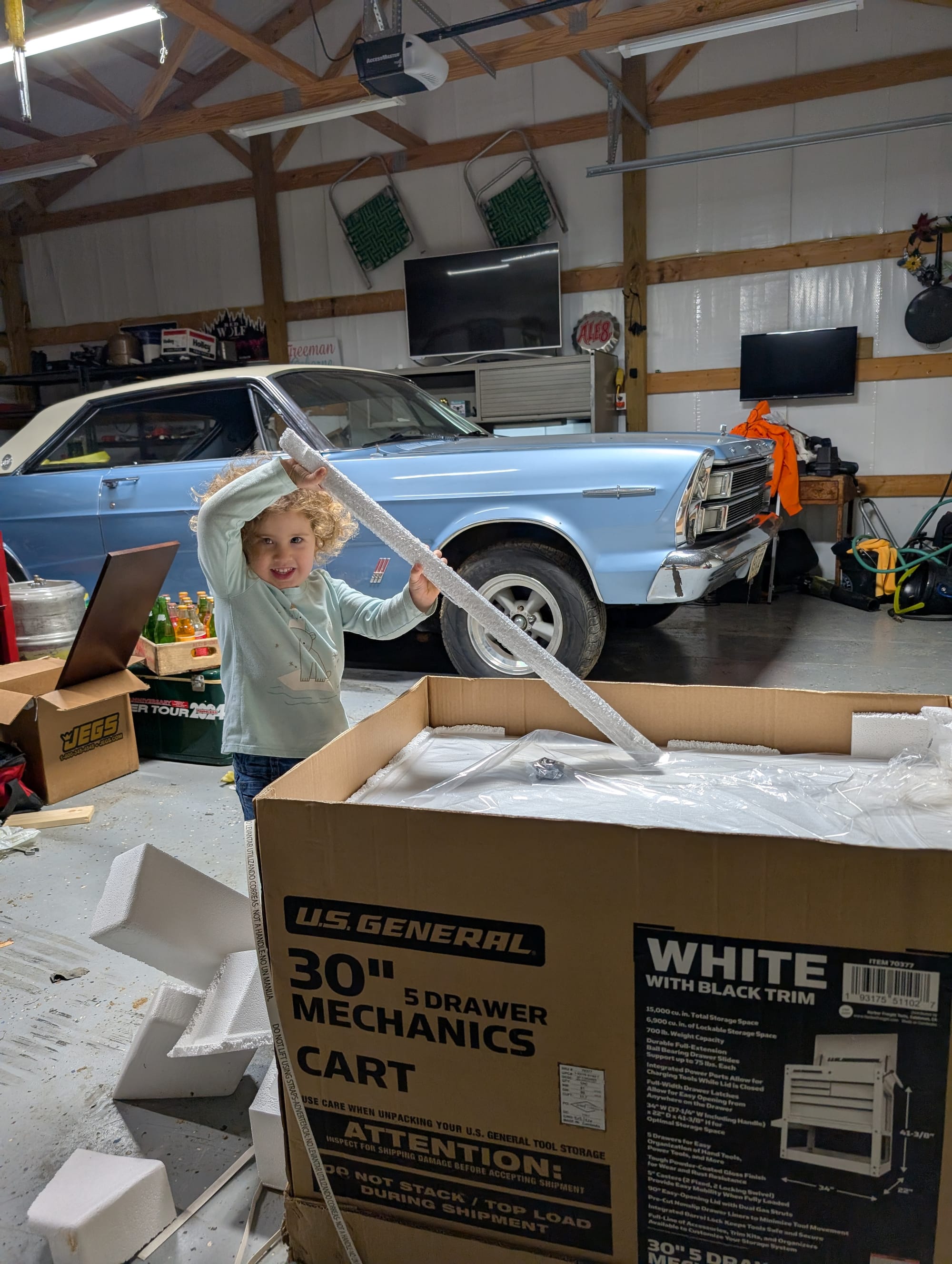 Helping me put together my new toolbox that my dad got me