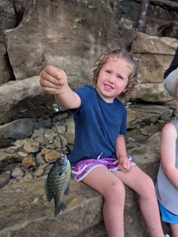 The kids were pulling in fish faster than we could bait the hooks